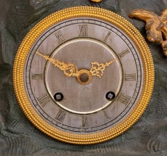 Charles X Vergoldete und patinierte figurale Bronzeuhr