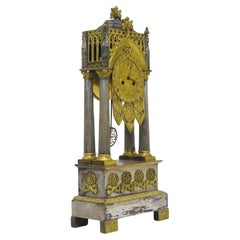 Horloge Charles X dorée et argentée