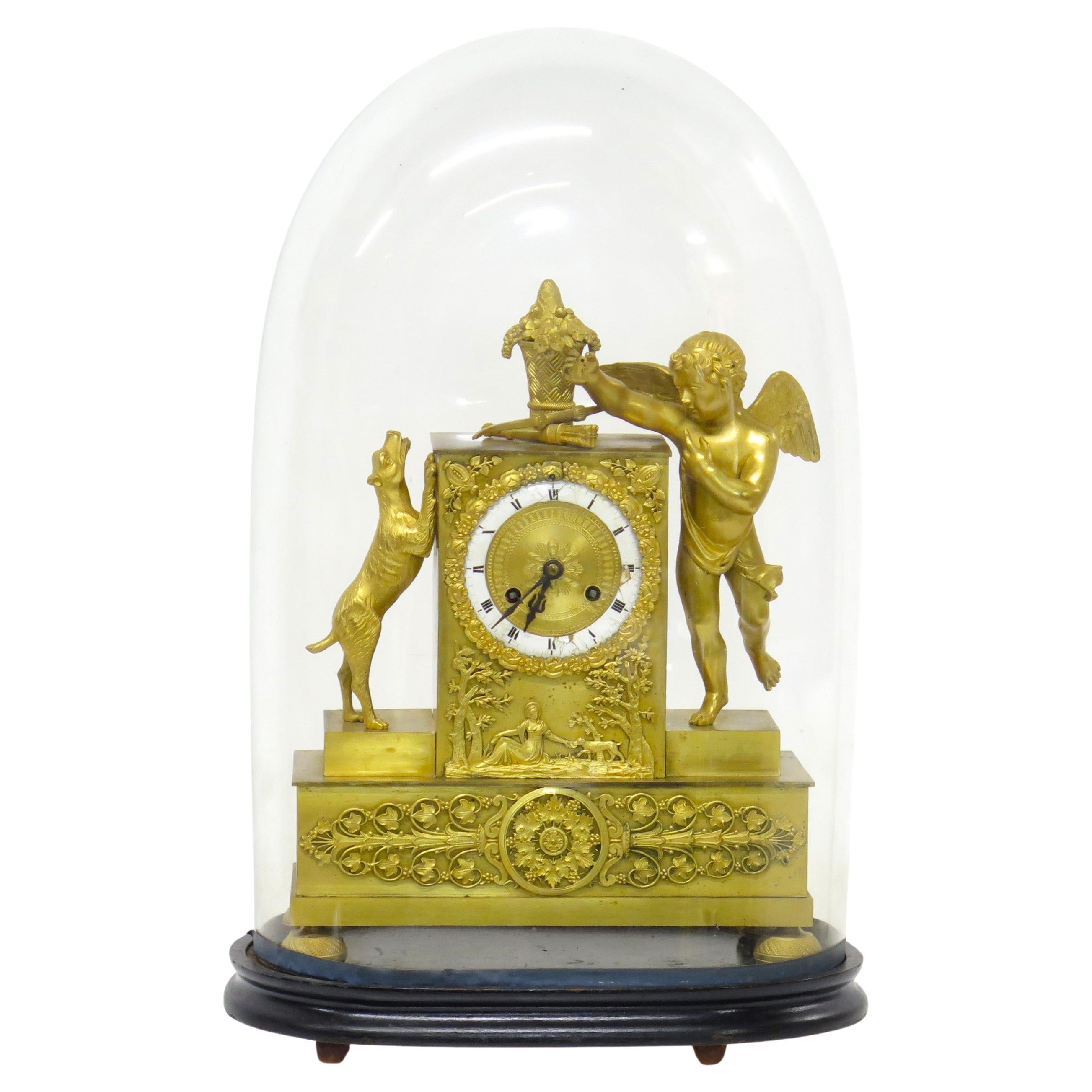 Charles X Gilt Bronze Mantel Clock with Cupid and a Dog Stamped Bechot For Sale