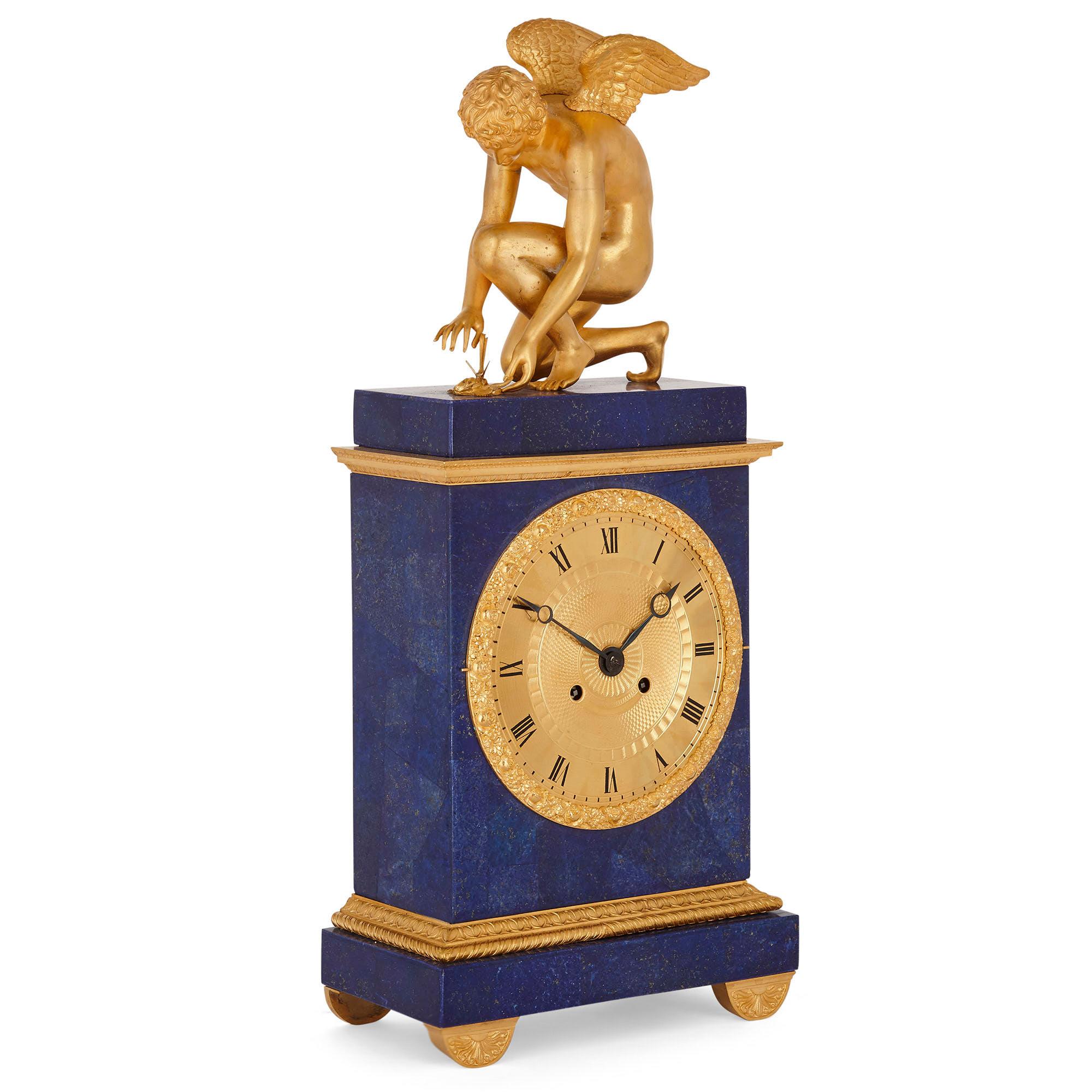 Charles X lapis and gilt bronze mantel clock
French, circa 1830
Measures: Height 56cm, width 25cm, depth 13cm

This finely modeled Charles X period clock with later lapis lazuli veneered decoration is a superb example of early 19th century