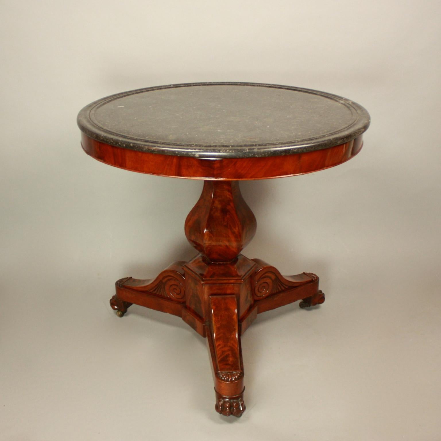 French 19th Century Charles X Mahogany Grey Marble Gueridon, Salon Table or Center Table

A Charles X mahogany gueridon or center table with original circular molded mottled Belgian Gris Sainte-Anne marble-top with ring trim above a central baluster