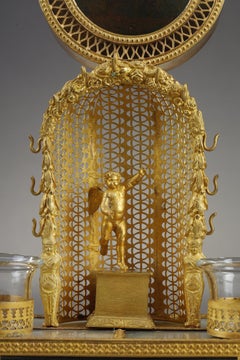 Charles X. Uhrenhalter und Tintenfass aus Perlmutt und Goldbronze
