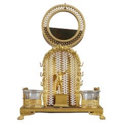 Charles X. Uhrenhalter und Tintenfass aus Perlmutt und Goldbronze