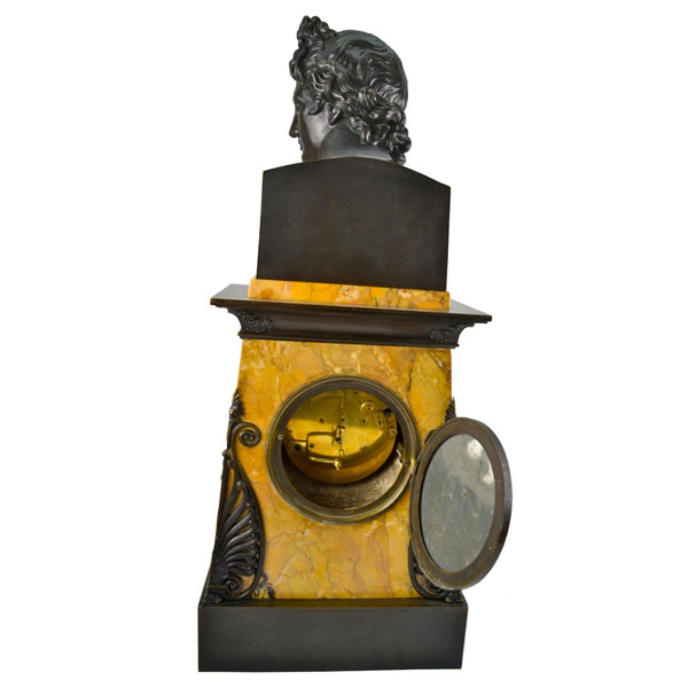 Hand-Carved   Empire Bronze and Sienna Marble Clock with a bust of Apollo Belvedere For Sale