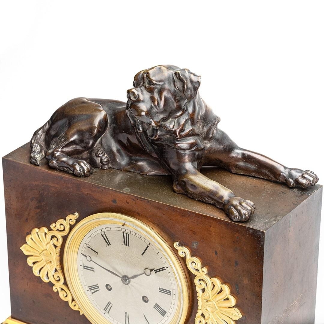 An unusual Charles X empire pendule with a mastiff bull dog. 
The dial is silvered with brequet hands and roman numbers which was very popular in the 19th century. 
an 8 days silk threat suspension striking movement. 
