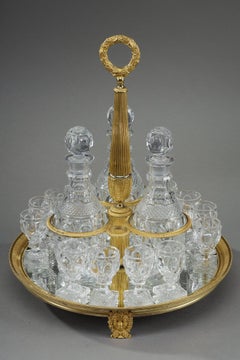 Charles X period liquor service in gilt bronze dans cut crystal