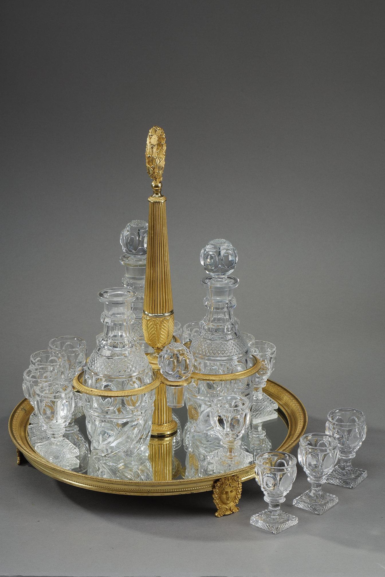 Gilt Charles X period liquor service in gilt bronze dans cut crystal For Sale