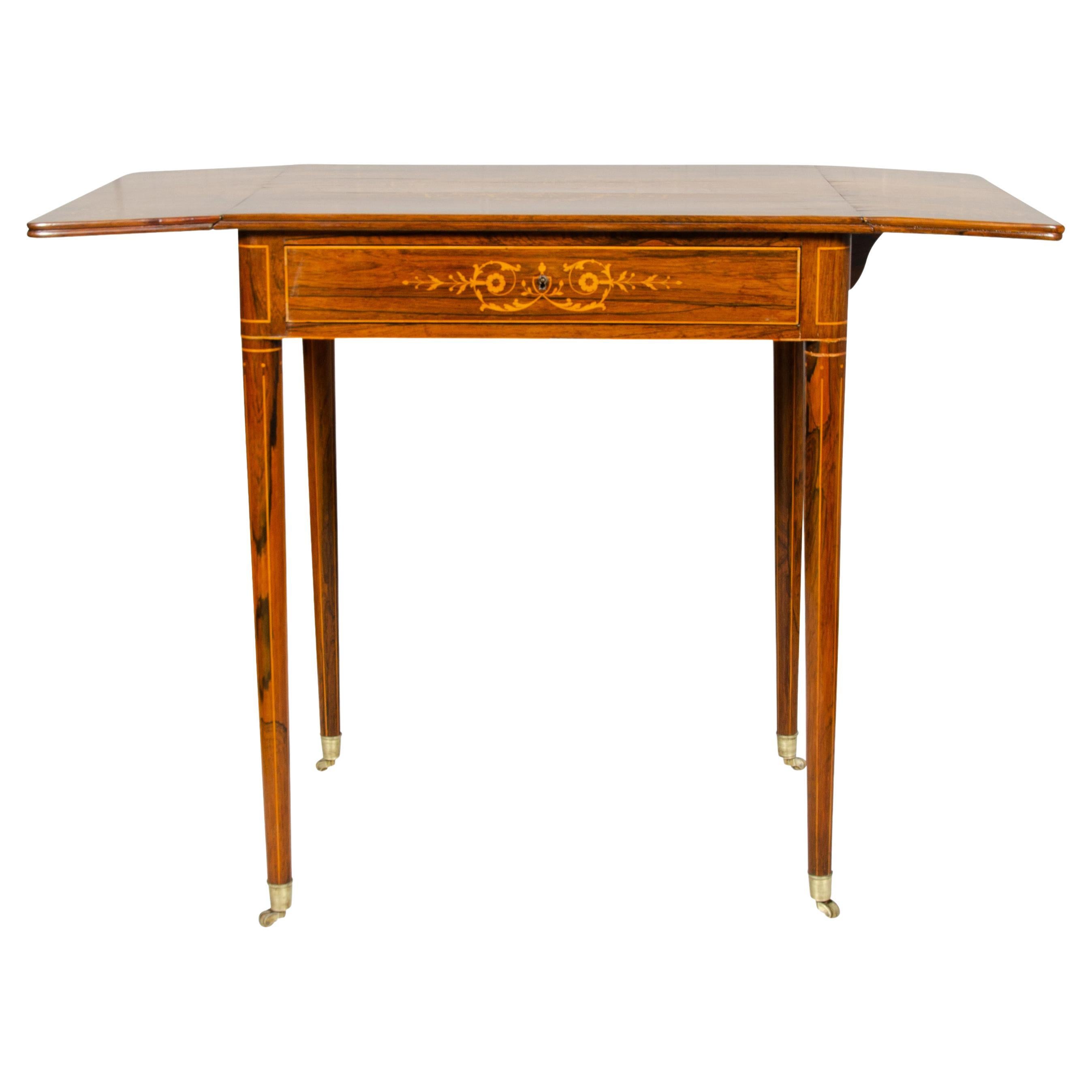Mesa Charles X de palisandro con hojas abatibles