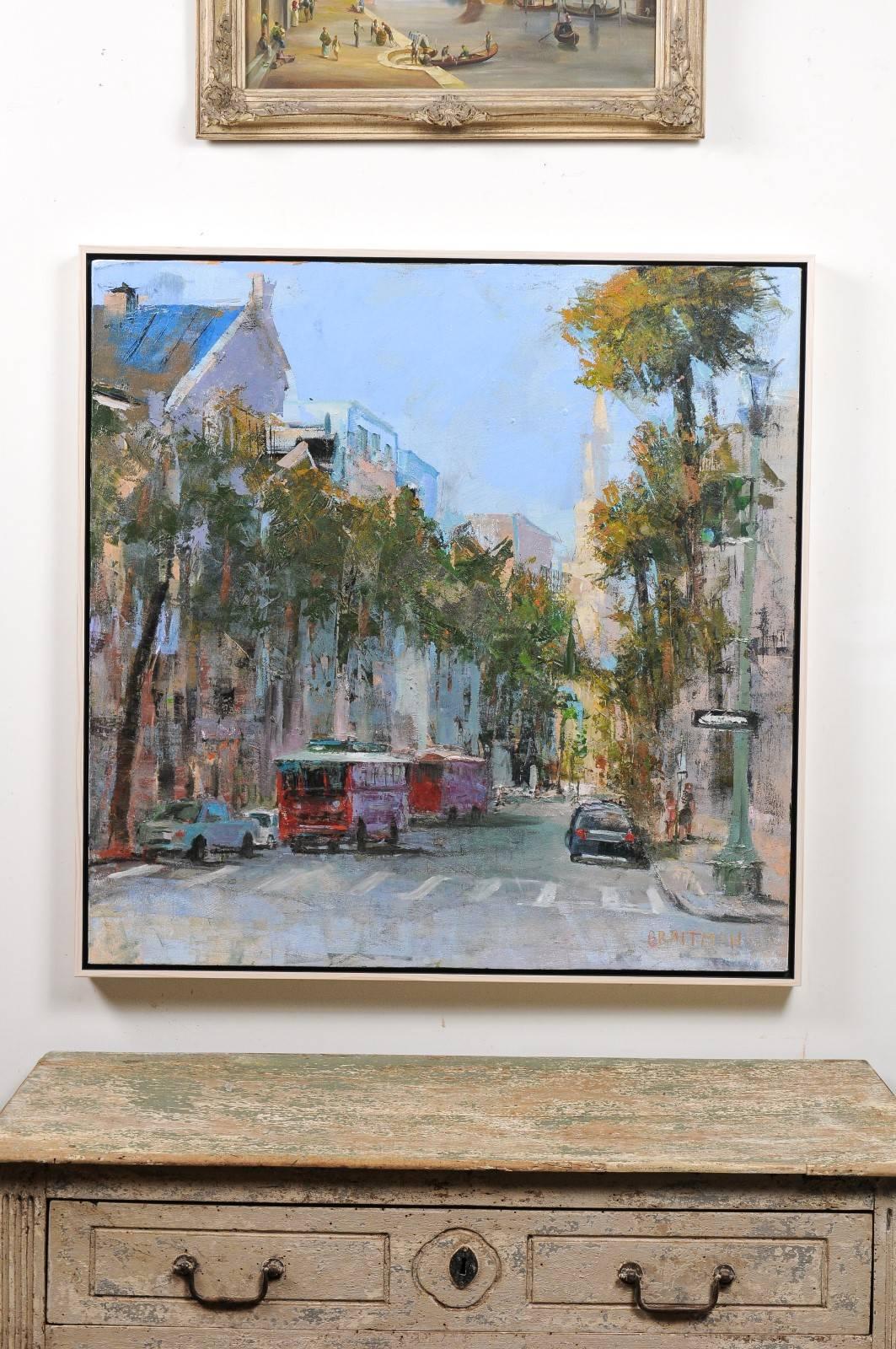 'Charleston Desire II', is a contemporary painting created by American artist Andy Braitman. This square format cityscape features a view of Charleston, with its recognizable church steeple discreetly evoked in the background, while two red busses