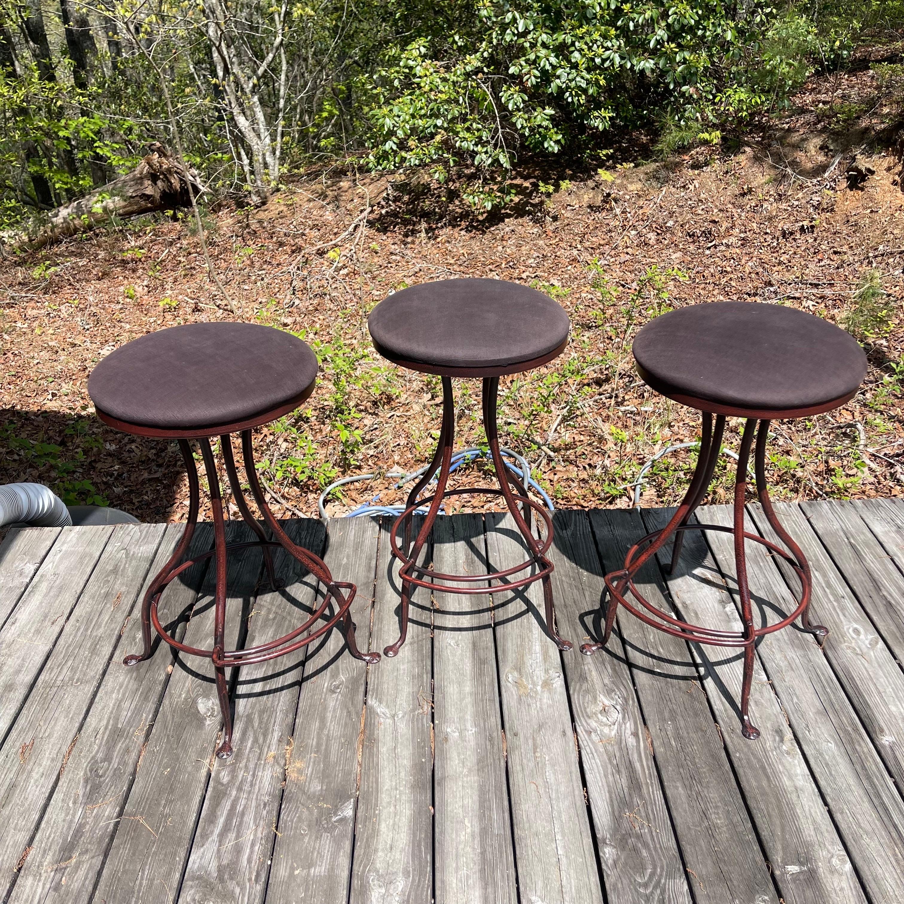 Fabulous set of modernist, patinated wrought iron counter height bar stools handmade by Charleston Forge.