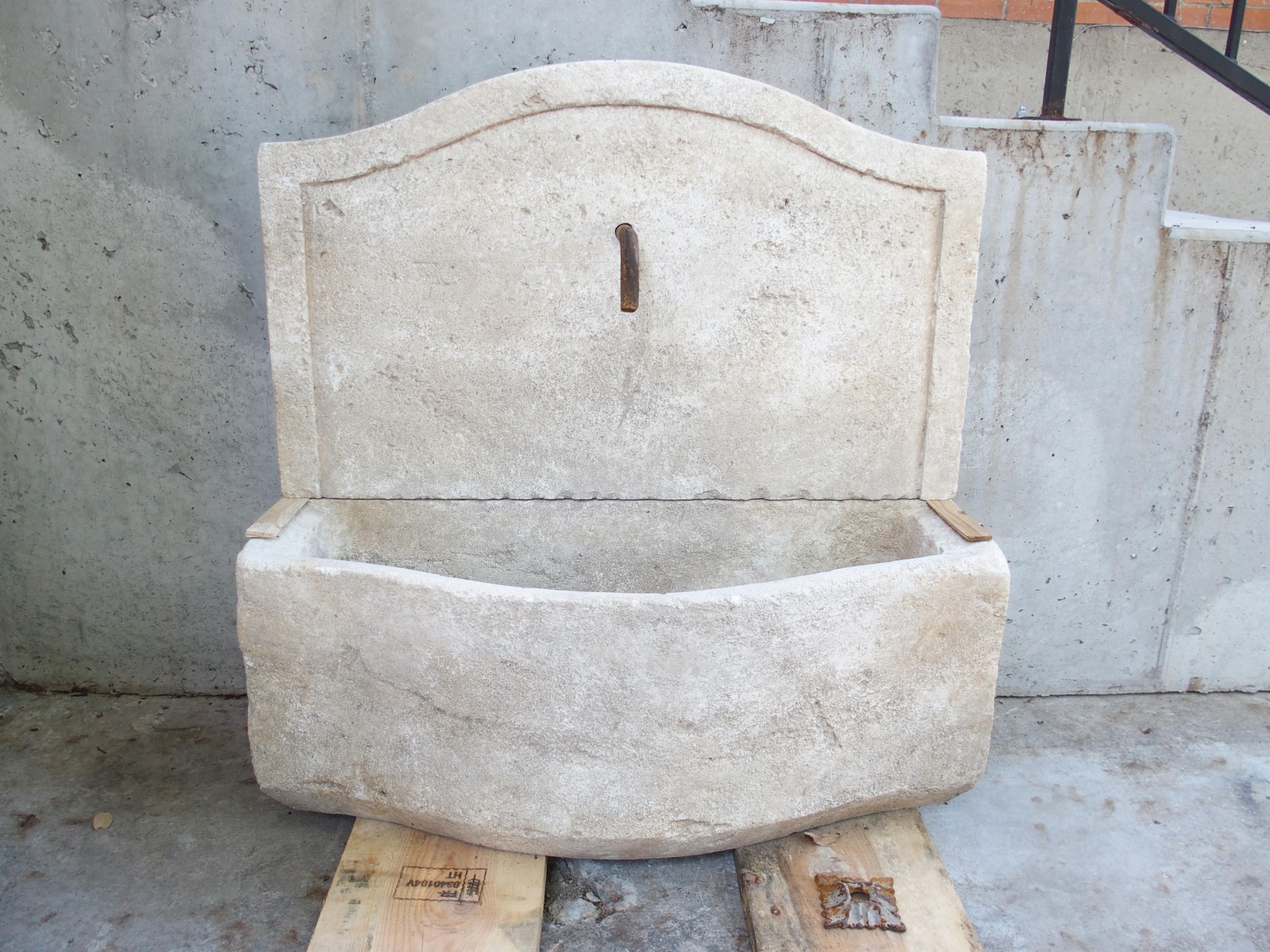 More information coming soon…

A perfect fountain for a smaller area, this wall fountain was hand carved in two sections of limestone in Provence, France. The shaped basin has been paired with an en chapeau wall that has been delicately carved with