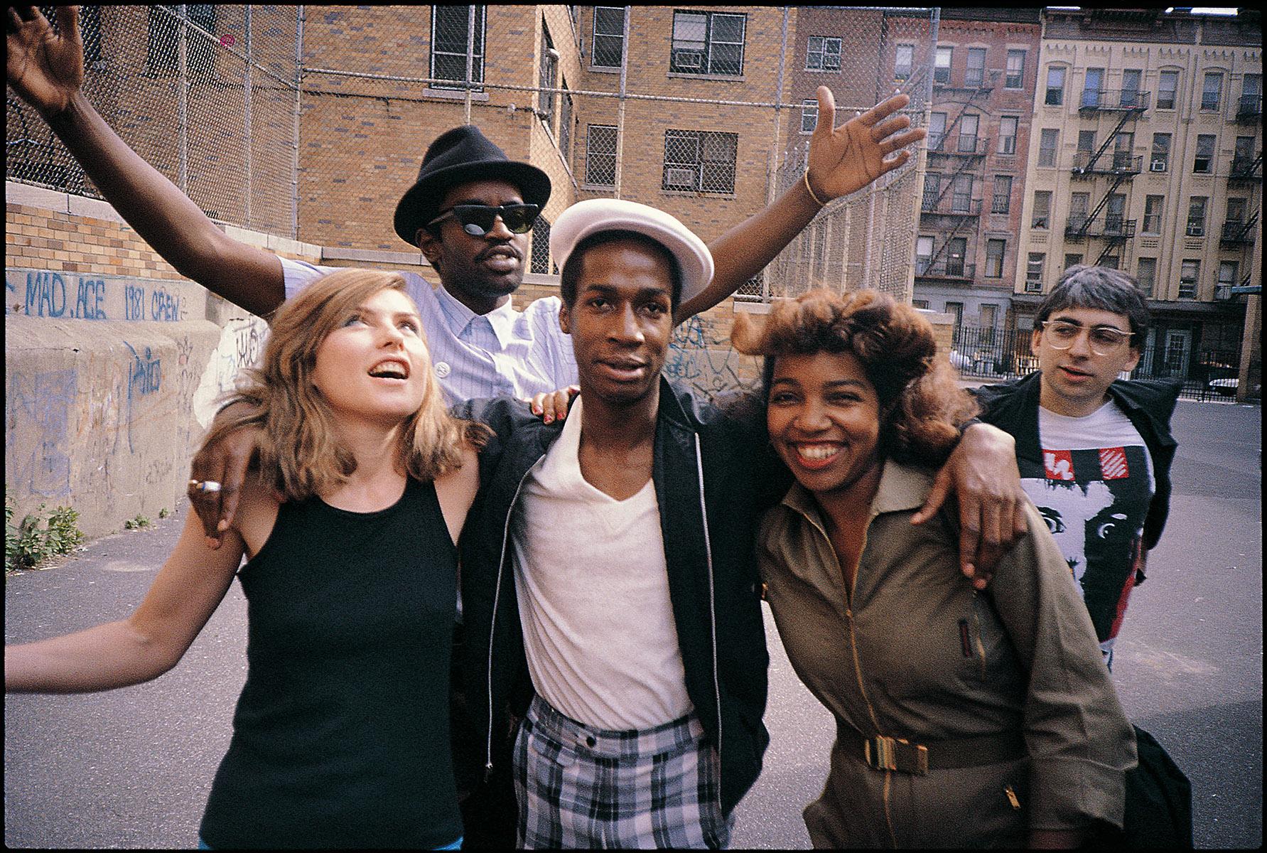 Grand Master Flash, Debbie Harry, Fab 5 Freddy, Chris Stein, & Tracy Wormworth captured by Charlie Ahearn of Wild Style; New York, NY 1981:
A seminal late 1970s/early 1980s art/music scene photograph included as part of the exhibition: 'New York,