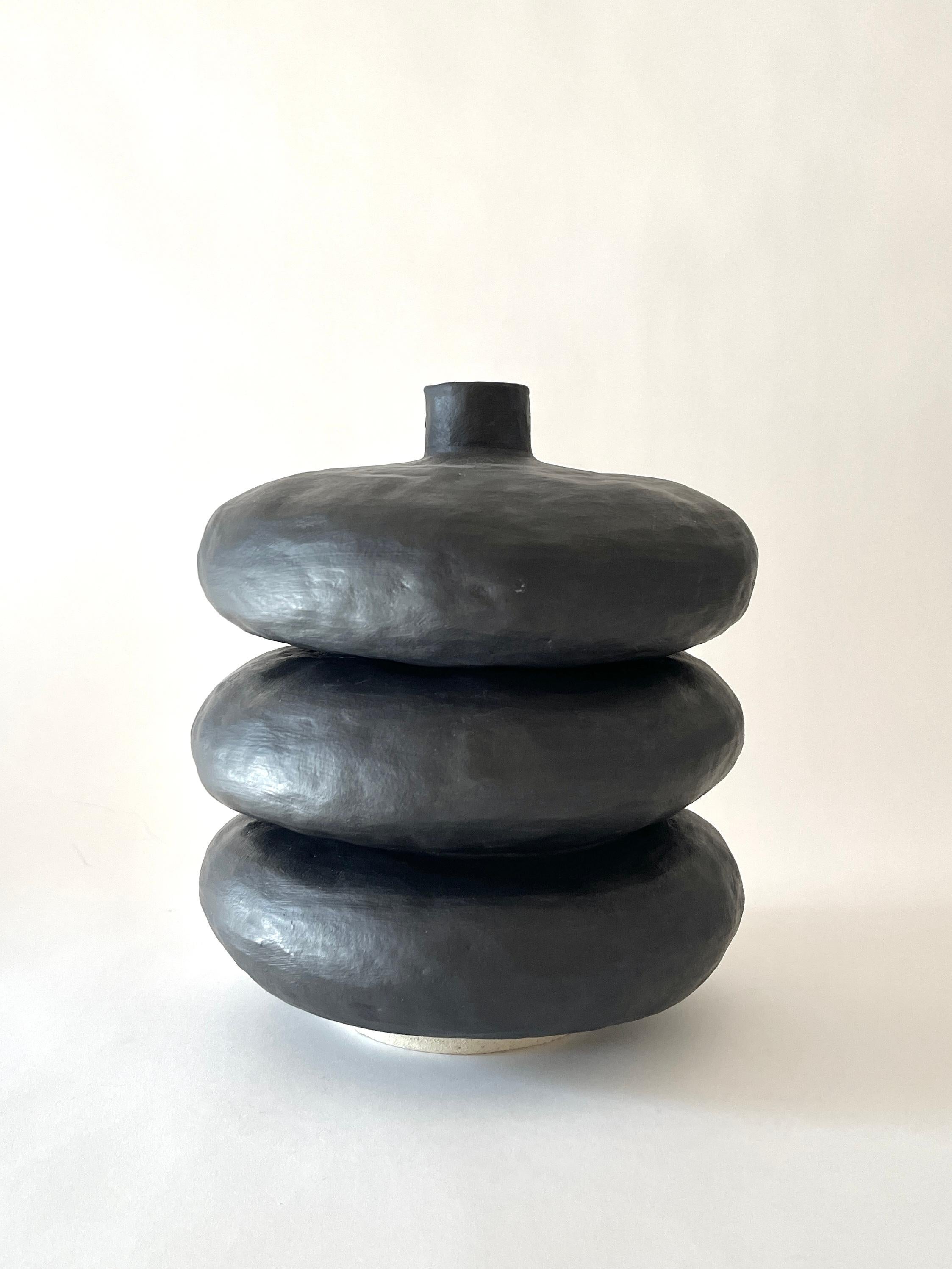 Charlie Black Vase by Meg Morrison
One of a kind.
Materials: ceramic.
Dimensions: Ø 23 x H 25.5 cm.

Also available in Yellow, Pink and White finishes. 

All sizes are approximate. Although vases are watertight condensation may form on the