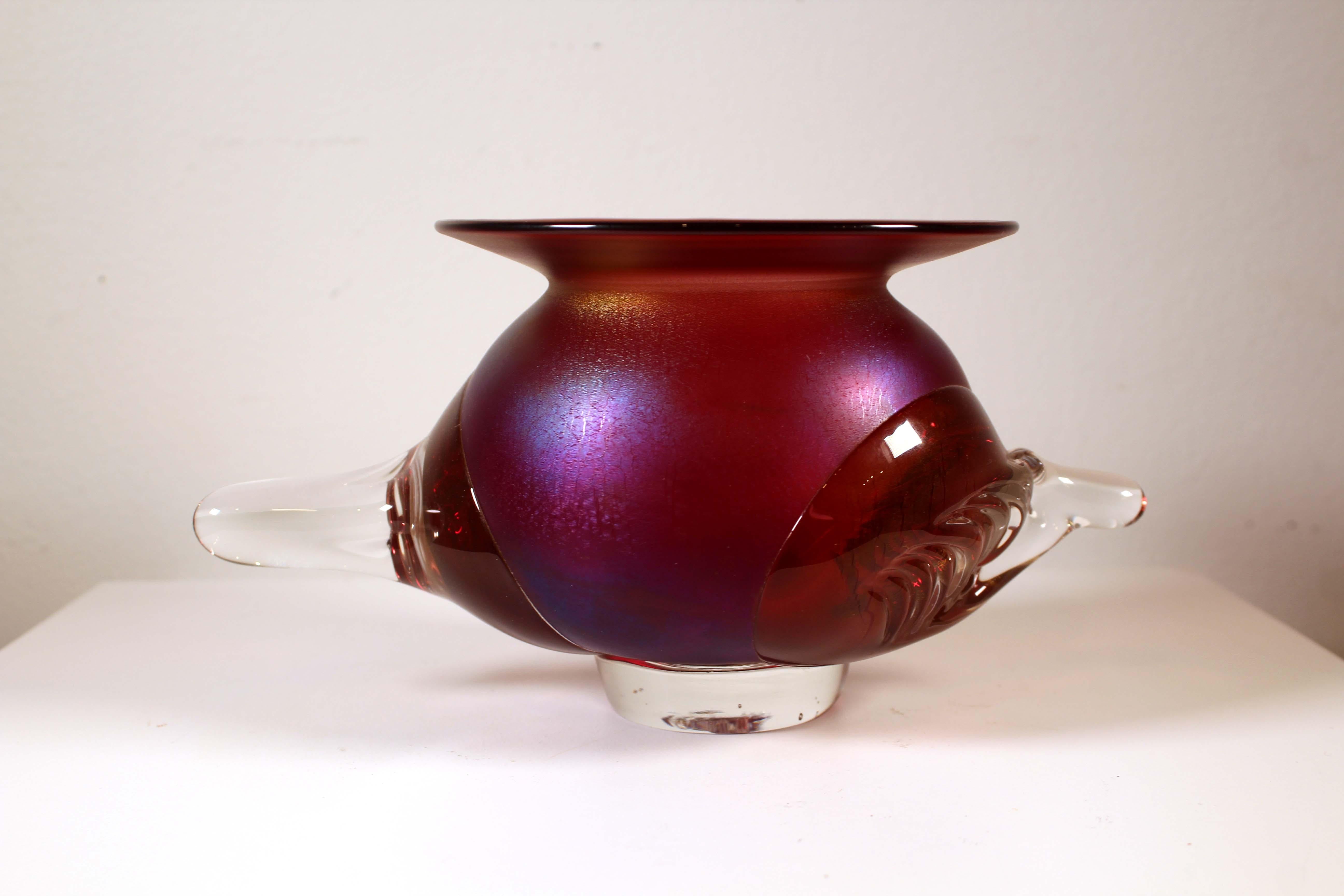 A lovely collection of contemporary iridescent glass vessels, one by American glass artist Charlie Parriott. From a private collection. Dimensions: 7.5” height x 2” diameter / 4.5” height x 8.5” width x 5” diameter / 3” height x 4.5” diameter / 1”
