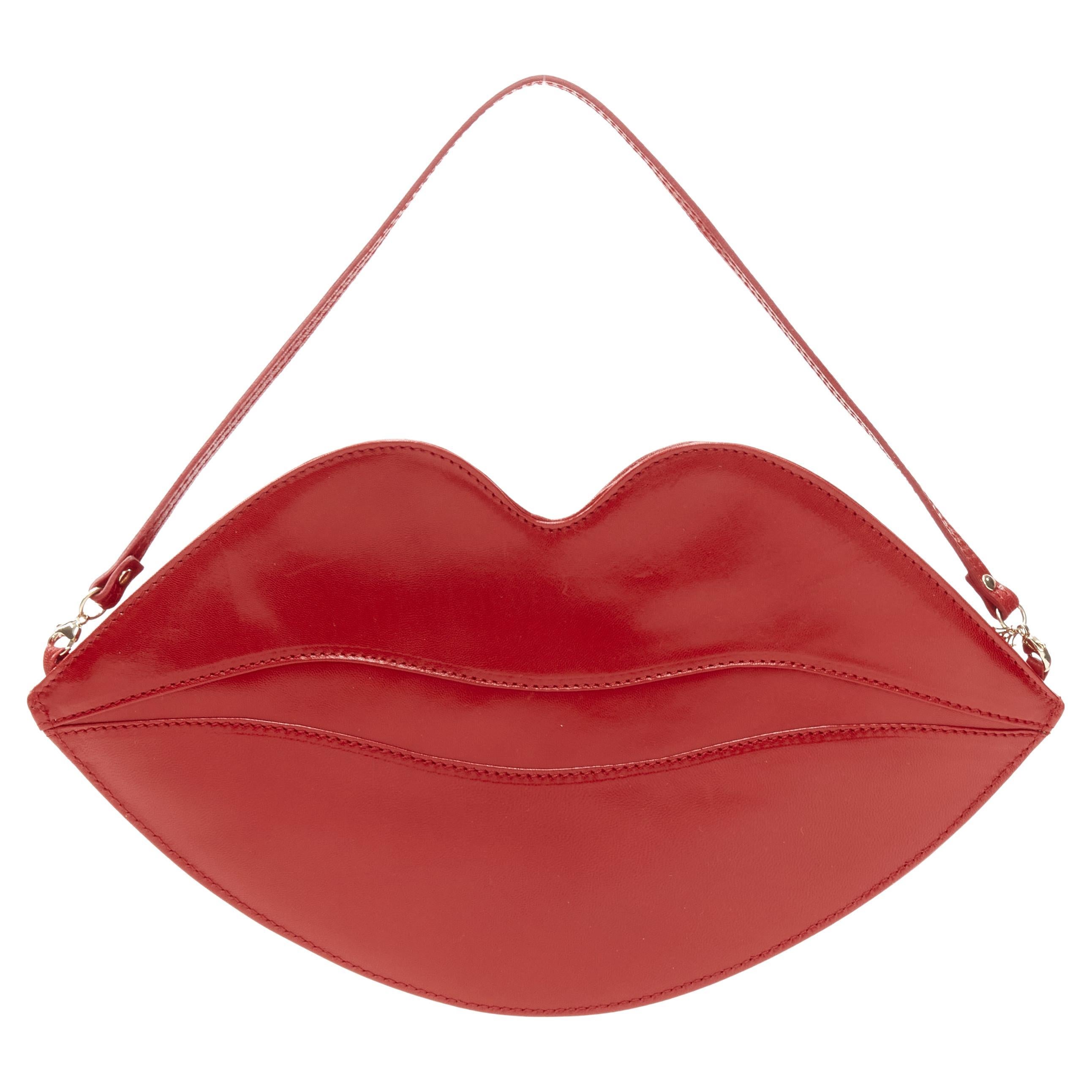 CHARLOTTE OLYMPIA Big Kiss red leather lips top handle flat zip bag