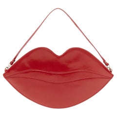 CHARLOTTE OLYMPIA Big Kiss red leather lips top handle flat zip bag