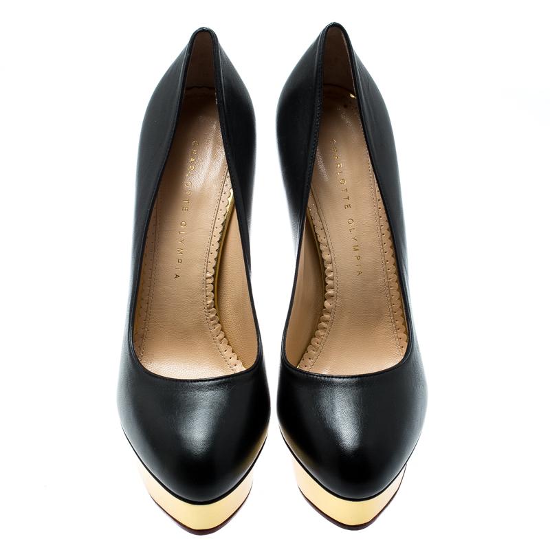 Own this meticulously designed pair of Charlotte Olympia pumps today and dazzle everyone whenever you step out! Crafted from leather and equipped with comfortable insoles, these pumps are from their Dolly collection. They have been beautified with