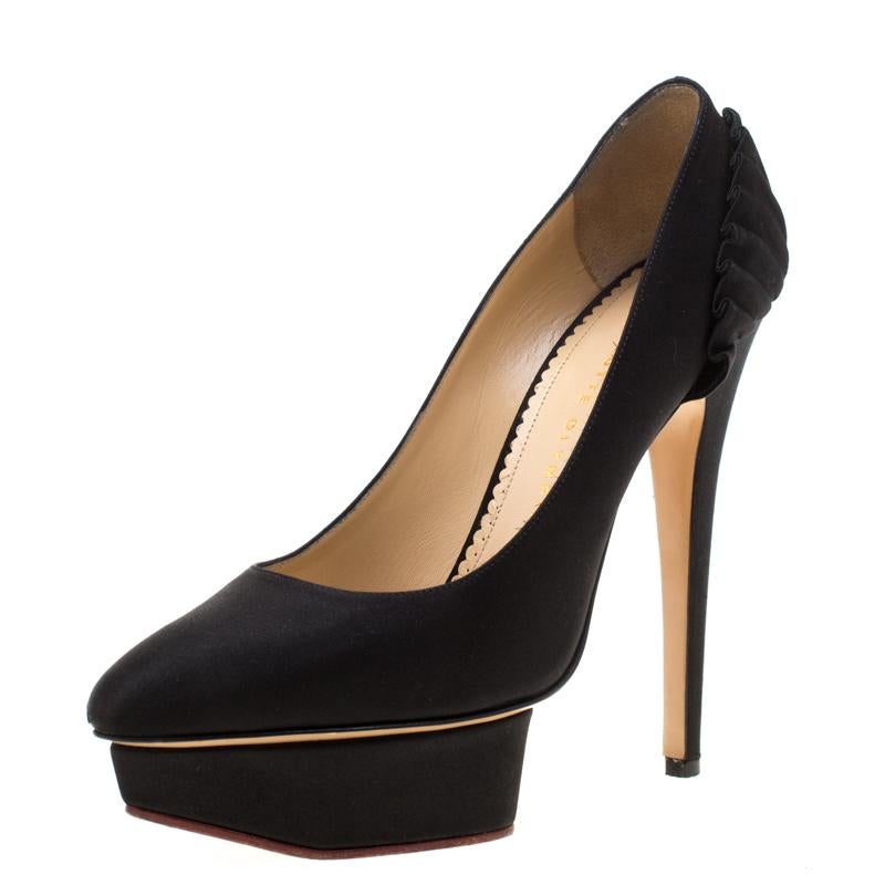 From their elegant craftsmanship to their impeccable style, these pumps from Charlotte Olympia are meant to elevate your shoe collection. These black pumps have been crafted from satin and they flaunt platforms, 15 cm heels and fan pleat detailing