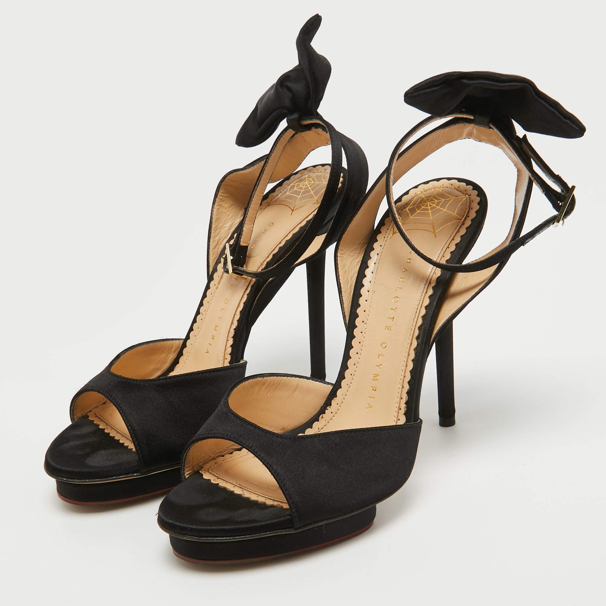 Elevate your ensemble with these Charlotte Olympia heels for women. Meticulously crafted, these exquisite heels exude luxury and style. A statement of grace and confidence, perfect for any occasion.