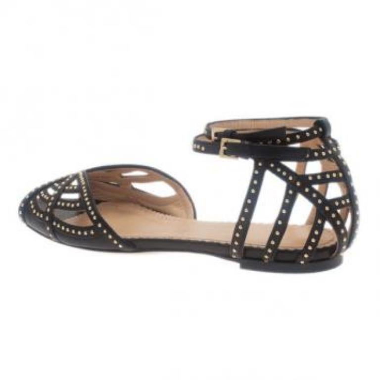 Noir Charlotte Olympia - Sandales à brides Octavia en cuir noir clouté - Taille 35,5 en vente