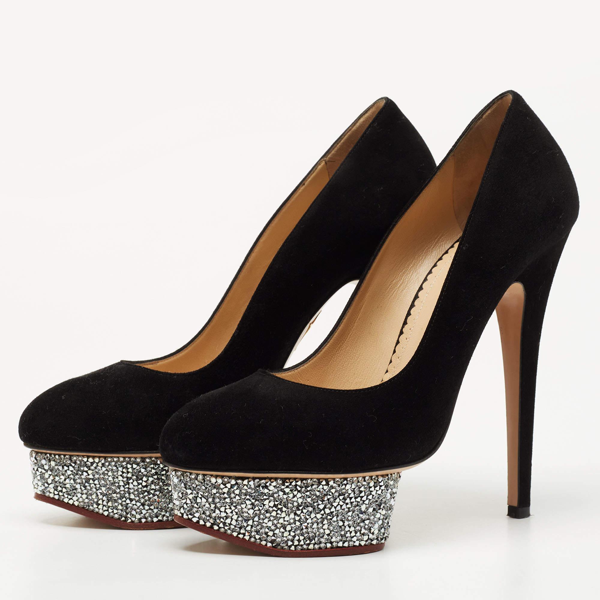 Exhibit an elegant style with this pair of pumps. These branded shoes for women are crafted from quality materials. They are set on durable soles and sleek heels.