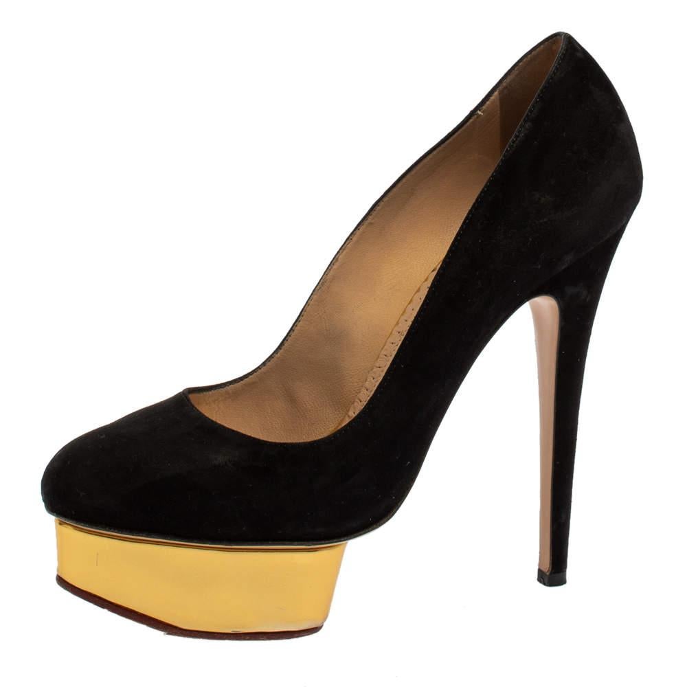 Own this meticulously designed pair of Charlotte Olympia pumps today and dazzle everyone whenever you step out Crafted out of suede and lined with leather on the insoles this creation is from their Dolly collection. They have been beautified with