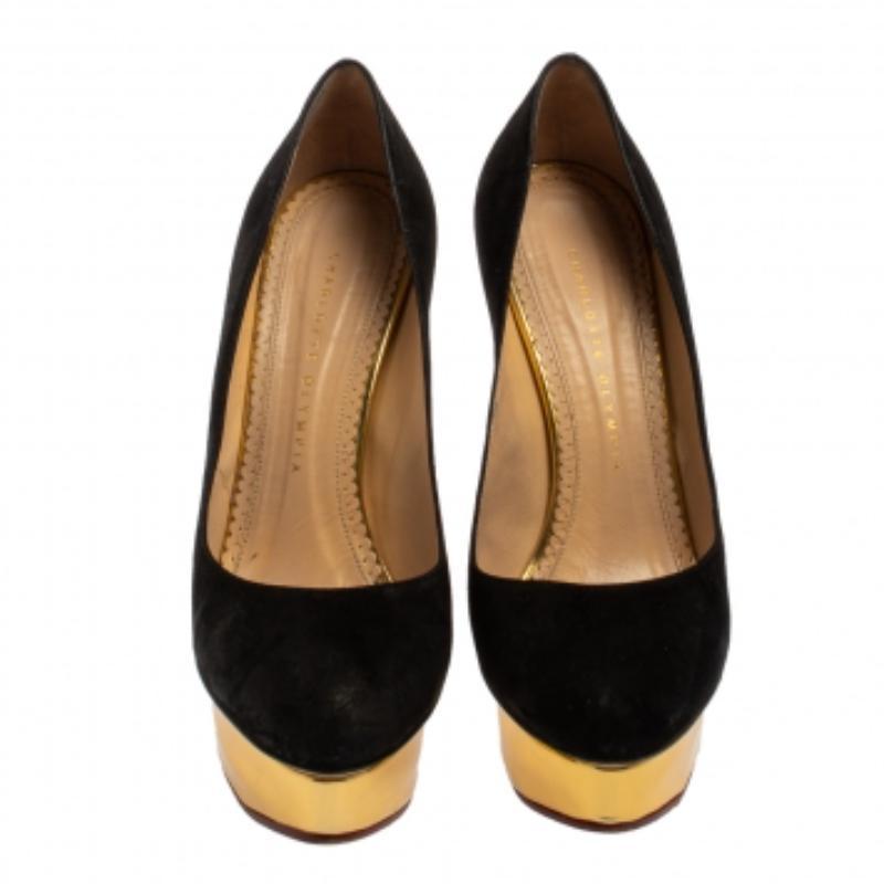 Own this meticulously designed pair of Charlotte Olympia pumps today and dazzle everyone whenever you step out! Crafted out of suede and lined with leather on the insoles, this creation is from their Dolly collection. They have been beautified with