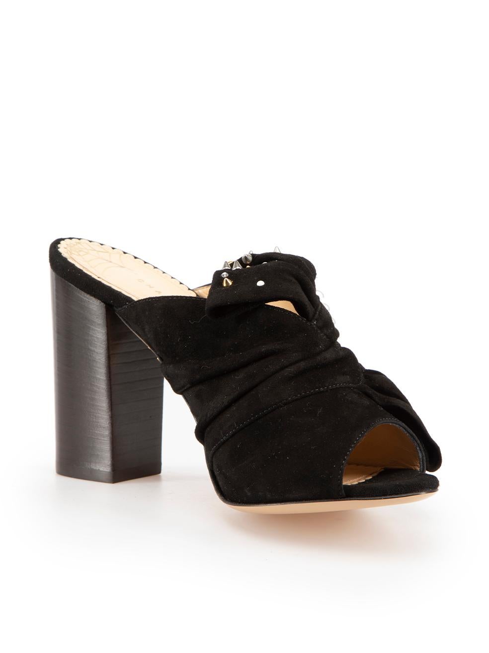 CONDITION is Never worn. No visible wear to Mules is evident on this new Charlotte Olympia designer resale item.
 
 
 
 Details
 
 
 Black
 
 Suede
 
 Heeled Mules
 
 Slip on
 
 Peep toe
 
 Pearl and stud embellished
 
 High heel
 
 
 

 
 Made in