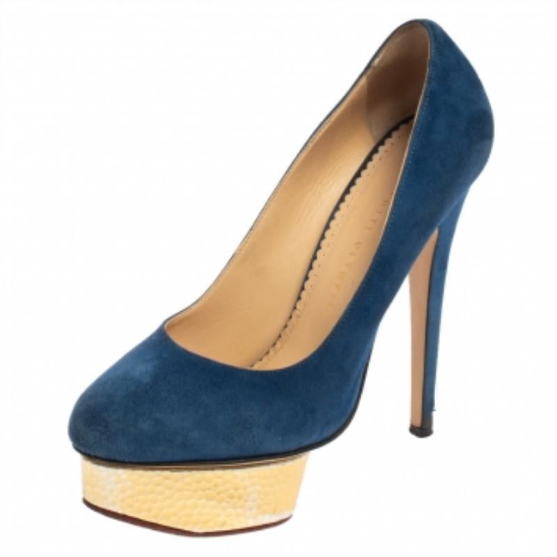 These meticulously crafted Dolly pumps from Charlotte Olympia are definitely something you should own as a fashionista. Made out of suede in a classy shade of blue, these pumps rest on elevated platforms and high stiletto heels to give your look