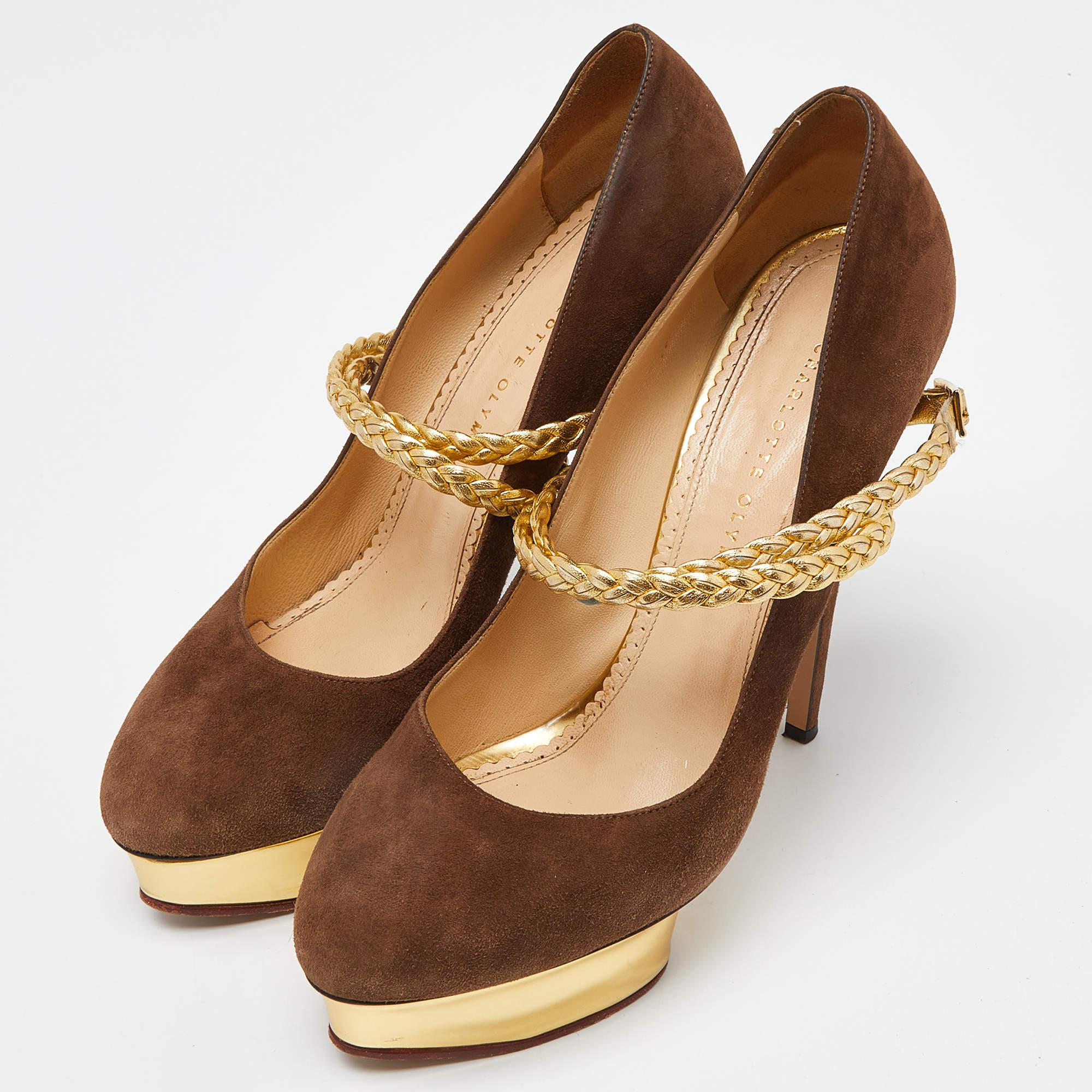 Make a chic style statement with these Charlotte Olympia platform pumps. They showcase sturdy heels and durable soles, perfect for your fashionable outings!
