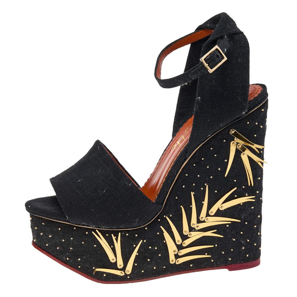 Every woman knows that wedges, no matter how high, are pretty easy to walk in. These Charlotte Olympia ones are the same, but with more fun and style. They have been designed with open-toes, ankle fastenings, and embellishments on the wedges.