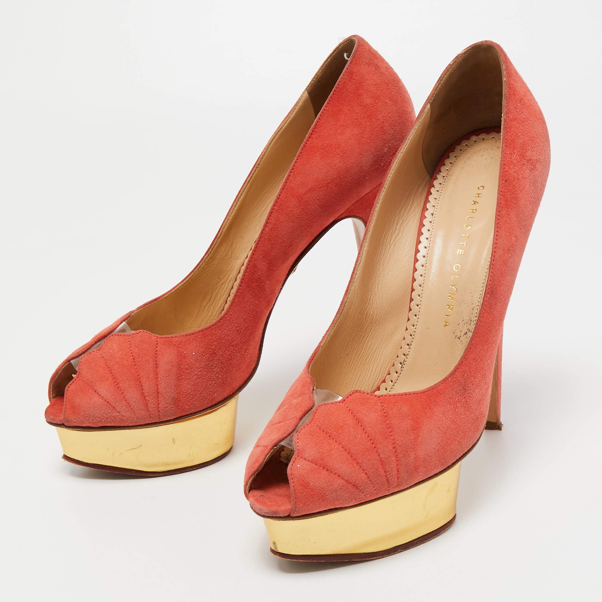 Complement your well put together outfit with these shoes by Charlotte Olympia. Bright and classy  they have an amazing construction for enduring quality and comfortable fit.