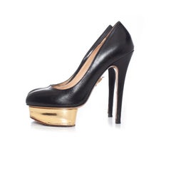 Charlotte Olympia, Décolleté con plateau in pelle Dolly