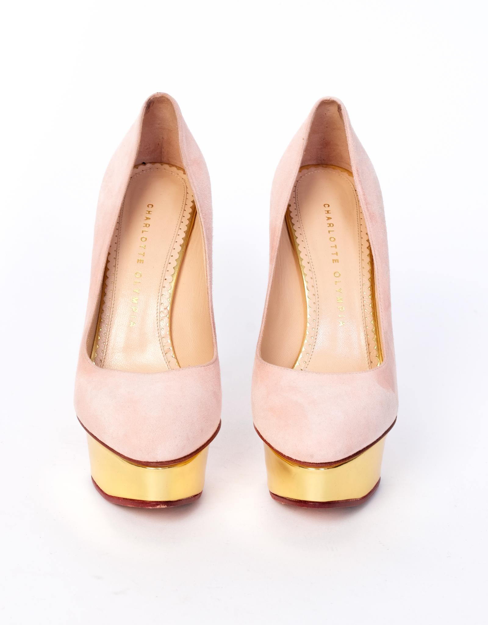 Charlotte Olympia Dolly nude suede heels with metallic platforms. Featuring a nude pink suede exterior and heels with a height of 140 mm, a beige leather interior and bottom, gold toned platforms with a height of 40 mm.

COLOR: Nude
MATERIAL:
