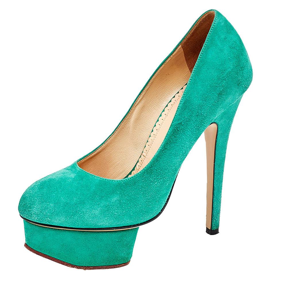 Own this meticulously designed pair of Charlotte Olympia pumps today and dazzle everyone whenever you step out! Crafted out of suede and lined with leather on the insoles, this creation is from their Dolly collection. They have been beautified with
