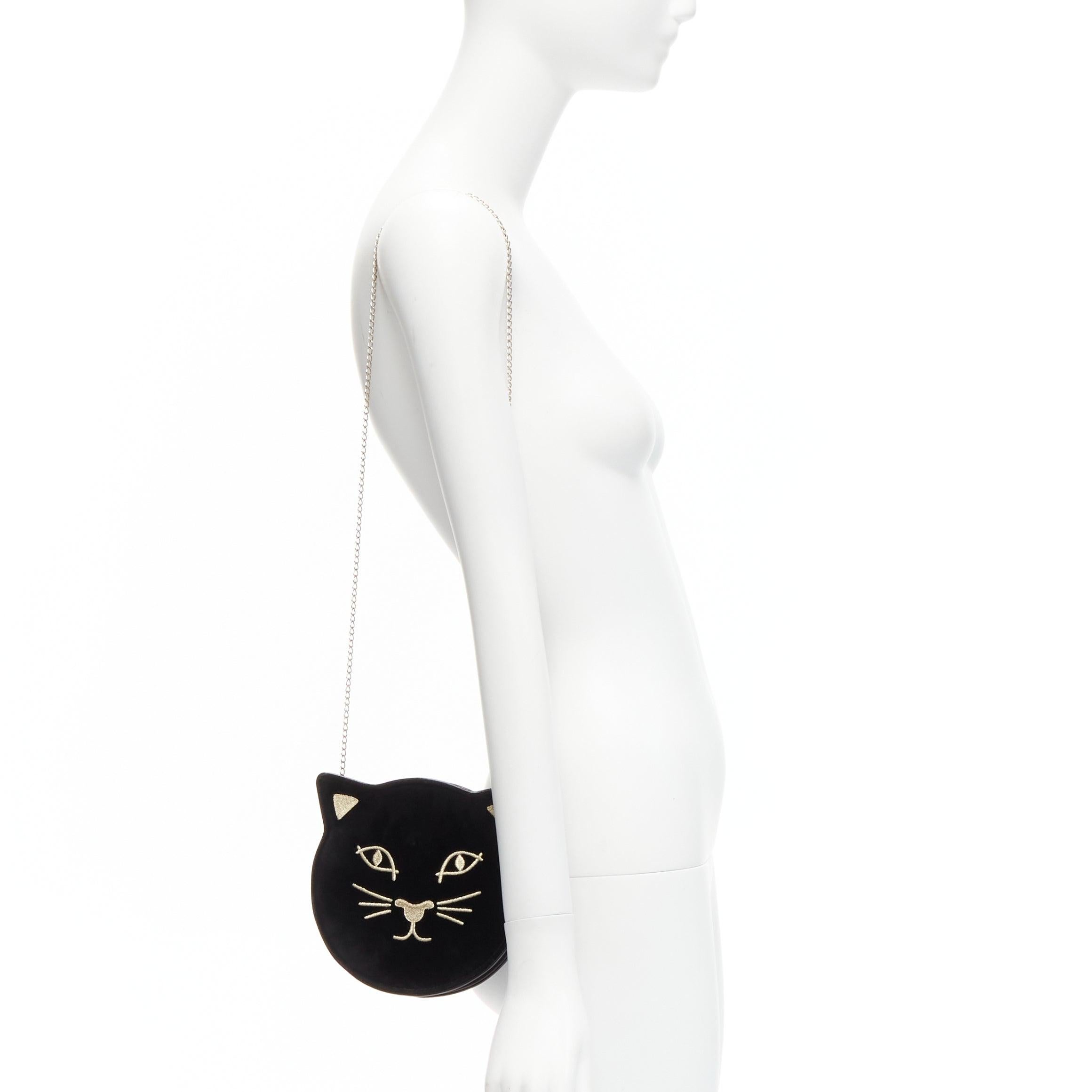 CHARLOTTE OLYMPIA Kitty black velvet gold embroidered crossbody bag
Reference: BSHW/A00066
Brand: Charlotte Olympia
Collection: Kitty
Material: Velvet
Color: Black, Gold
Pattern: Solid
Closure: Zip
Lining: Beige Fabric
Extra Details: Signature