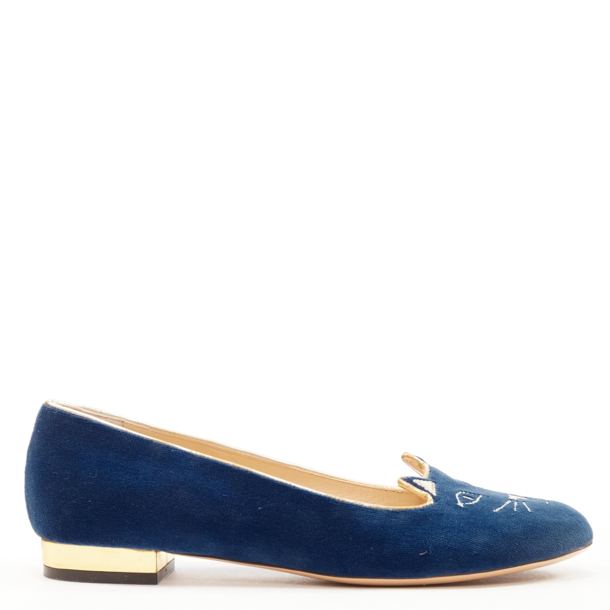 CHARLOTTE OLYMPIA Kitty blue velvet gold cat face embroidery flats EU37.5 
Reference: SNKO/A00203 
Brand: Charlotte Olympia 
Model: Kitty flats 
Material: Velvet 
Color: Blue 
Pattern: Solid 
Made in: Italy 

CONDITION: 
Condition: Very good, this