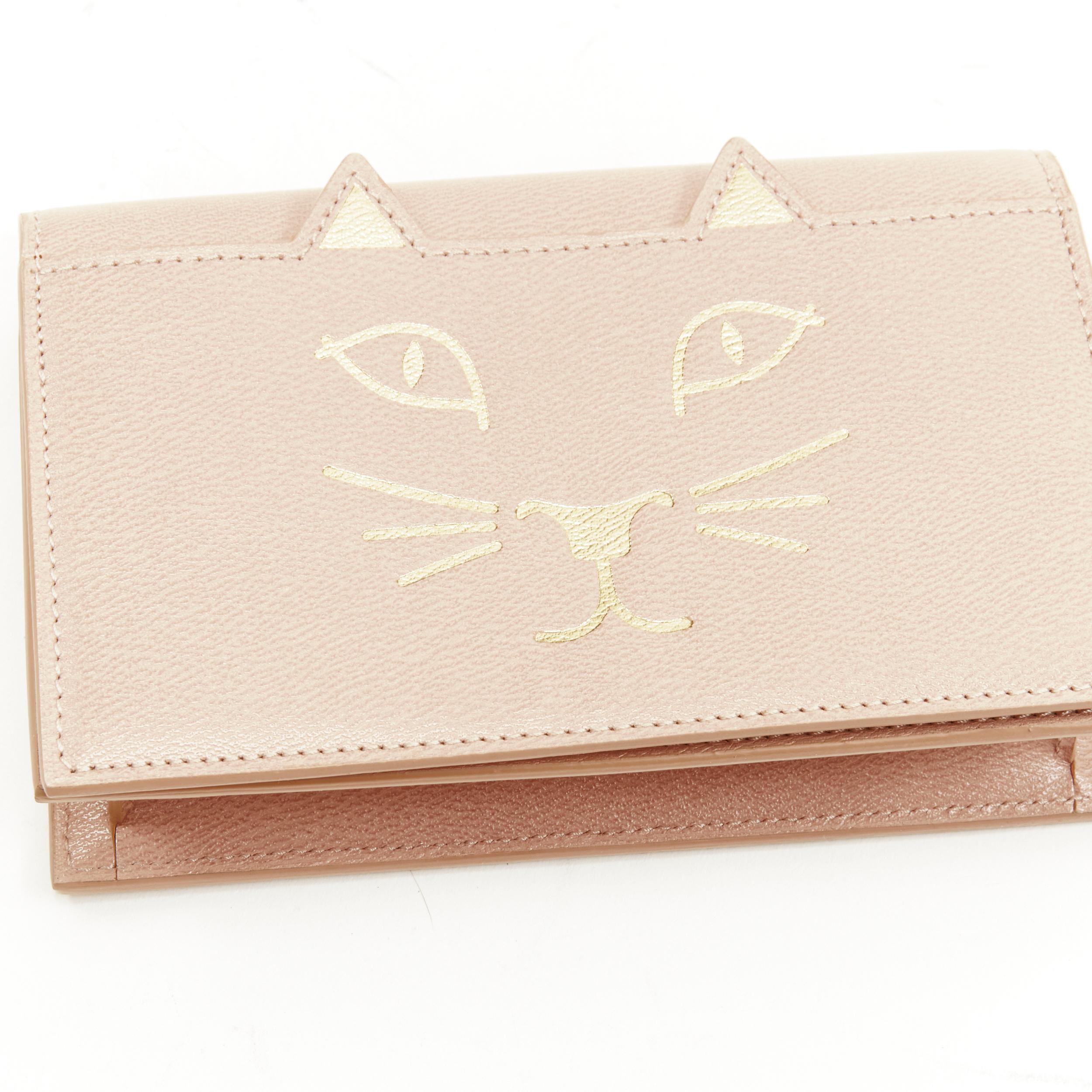 CHARLOTTE OLYMPIA Kitty blush nude gold cat face print leather crossbody bag 1