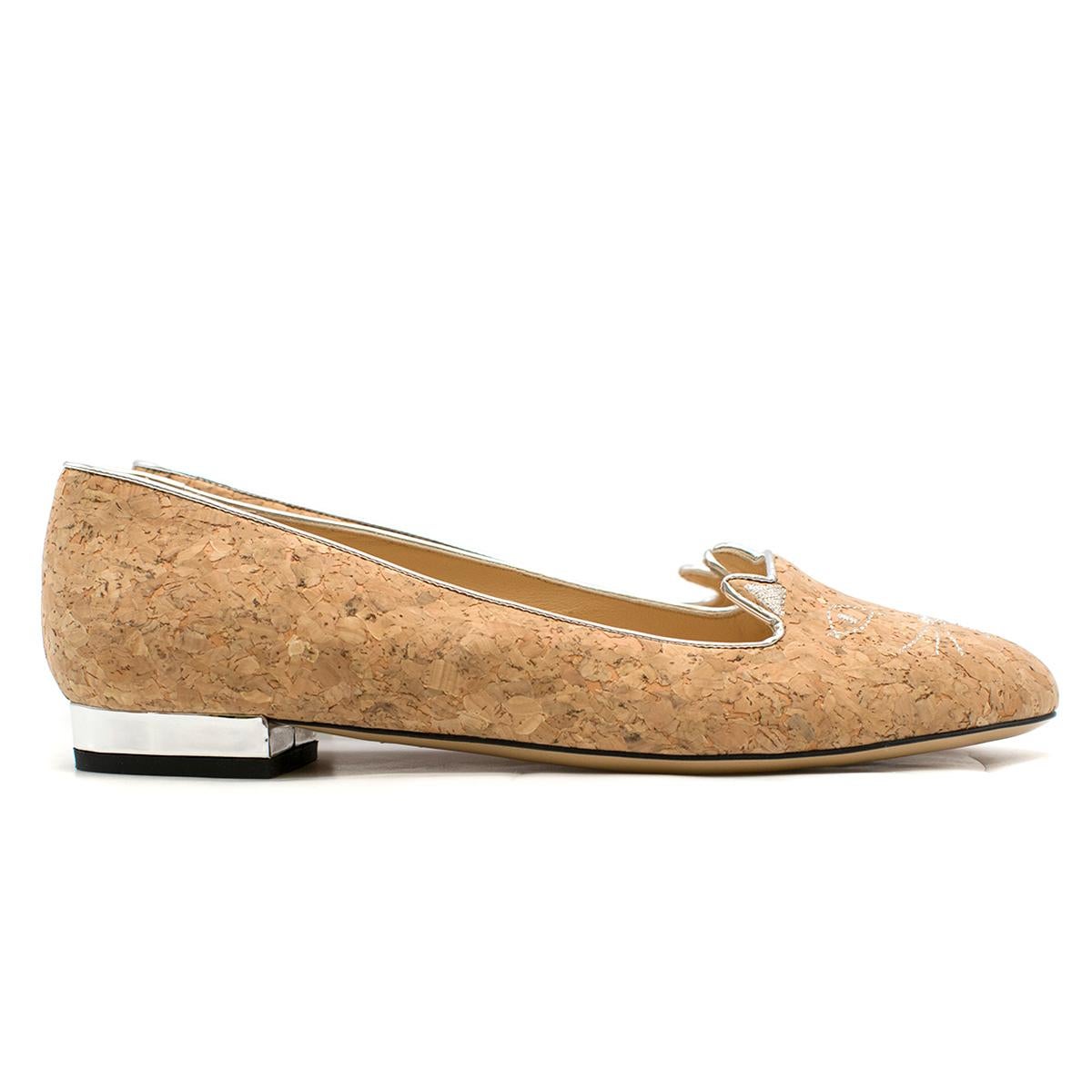 Charlotte Olympia Kitty Cork Loafers

- Kity flats in cork 
- Round toe
- Cat design to the toe ares
- Slip-on style
- Nude leather insole and sole
- Small Silver heel

This item comes with the original dust bag.

Please note, these items are