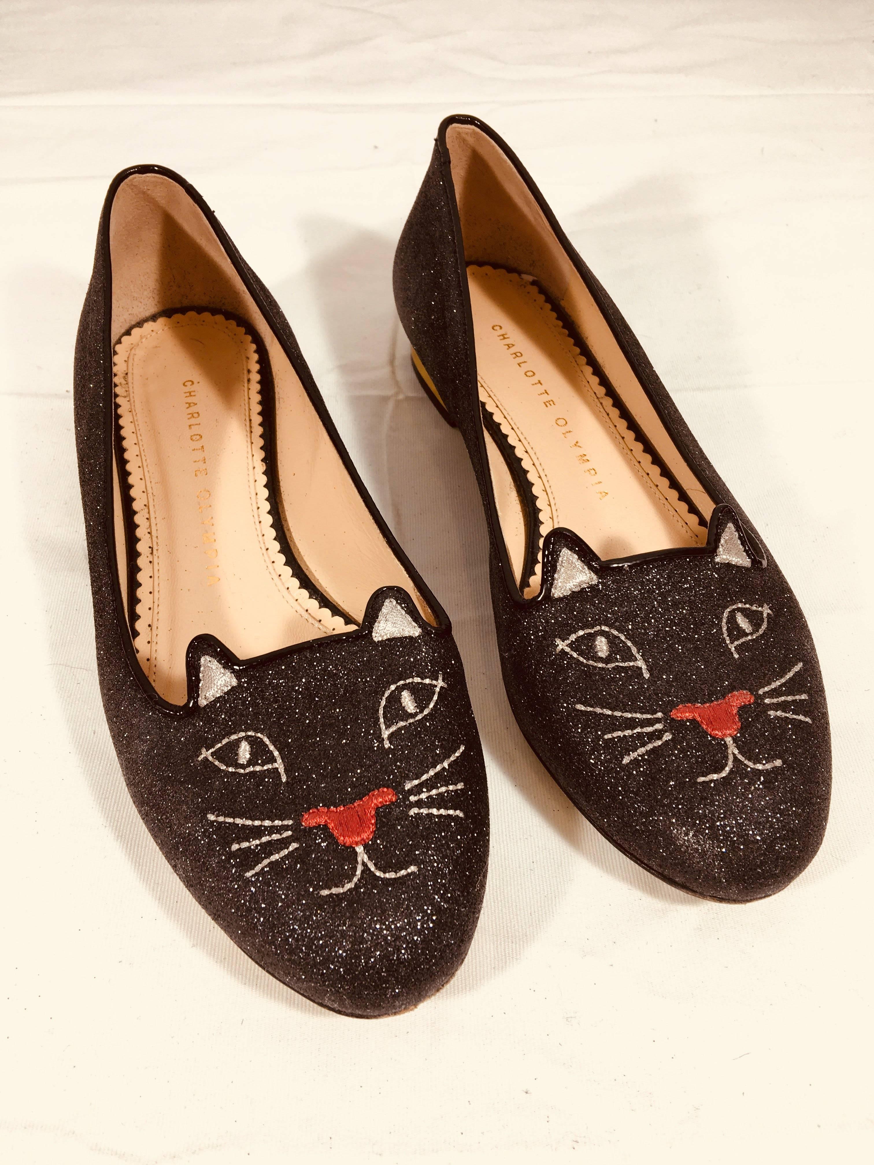 Charlotte Olympia Kitty Loafers. Black Glitter with Round Toe with Embroidered Cat Detail and Golden Wrapped Heel.