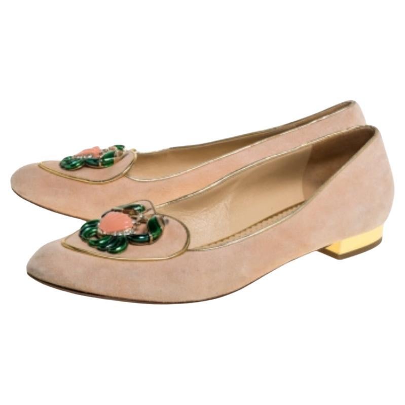 The zodiac Cancer has a crab as its symbol and these ballet flats from Charlotte Olympia Olympia carry these crab motifs on the uppers. They have been crafted from beige suede and styled with round toes and gold-tone hardware detailed heels. They