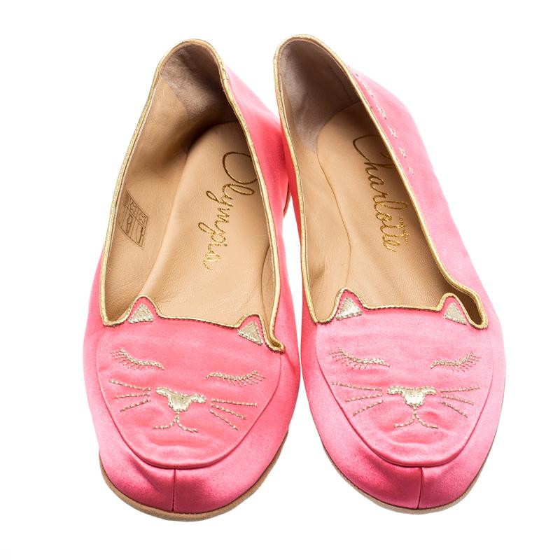 Adorn your feet with these pretty flats from Charlotte Olympia. They come crafted from satin and styled with cat face embroidery on the uppers. Grab these cute flats and be sure to have the best dreams. They come with a matching eye mask and a
