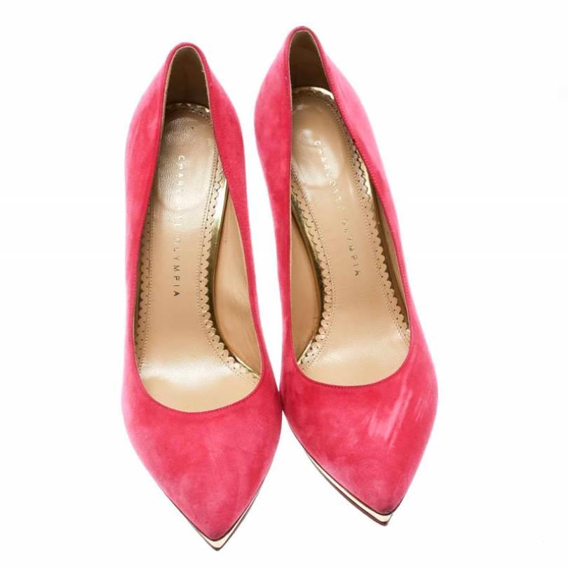 Bring home these Charlotte Olympia pumps today and get set to enjoy dazzling day-outs! Crafted out of suede in a heart-skipping pink shade and lined with leather on the insoles, this number is from their Dotty collection. They've been beautified