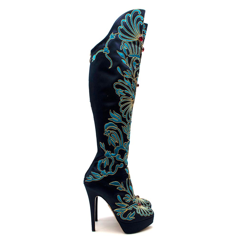 Charlotte Olympia Prosperity Blue & Gold Knee High Boots

-Blue and gold embroidery detail throughout
-Zipper all the way down back
-High heel platform boot
-Round toes
-Tonal stitching
-Over-the-knee design

Materials: -Silk satin upper
-Calfskin