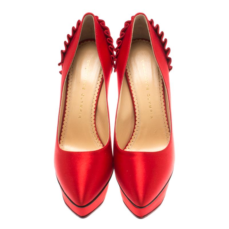 Ravishing in red, these Paloma pumps from Charlotte Olympia are here to make you fall in love with them! They have been crafted from satin and styled with almond toes and an artistic fan pleat detailing on the heel counters. They come equipped with