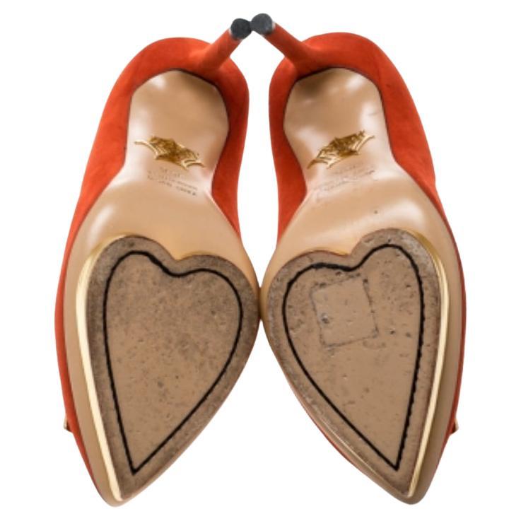 Add a fairytale touch to your shoe collection by owning this gorgeous pair of platform pumps from Charlotte Olympia. Crafted from suede and lined with leather on the insoles, they are balanced on stiletto heels. The pumps are completed as a