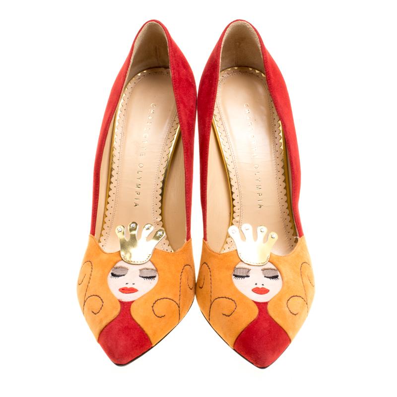 An all-time favourite with her unique designs, Charlotte Olympia brings to you these red pumps to walk with elan. These pumps are crafted from suede and feature an elegant silhouette. They flaunt pointed toes with a Sleeping Beauty motif and