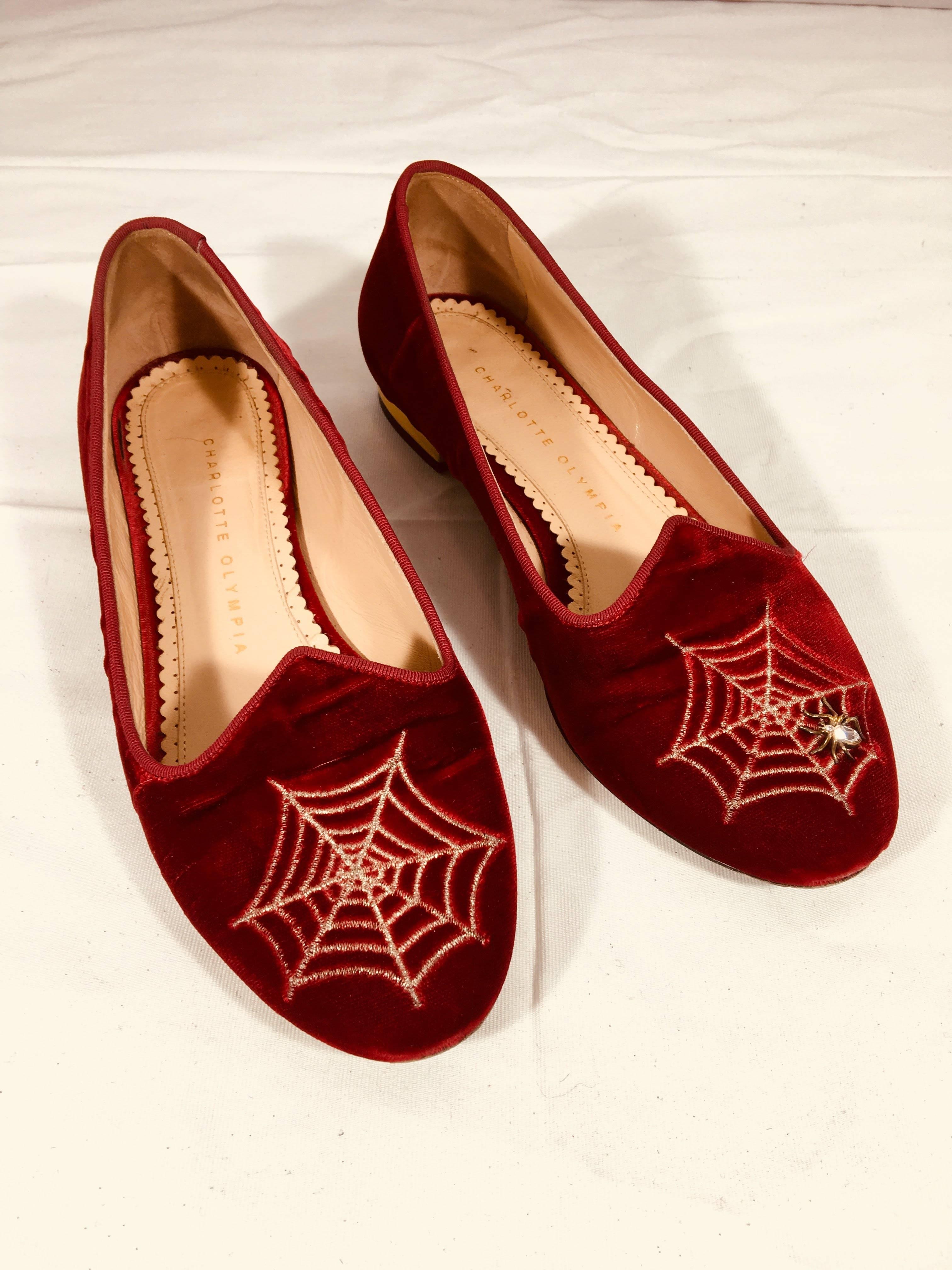 Charlotte Olympia Spider Web Loafers. Red Velvet with Round Toe with Embroidered Spider Web and Left Shoe with Embellished Spider.