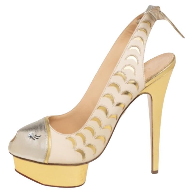 Charlotte Olympia Sandali con piattaforma in pelle di mare di tre colori misura 39