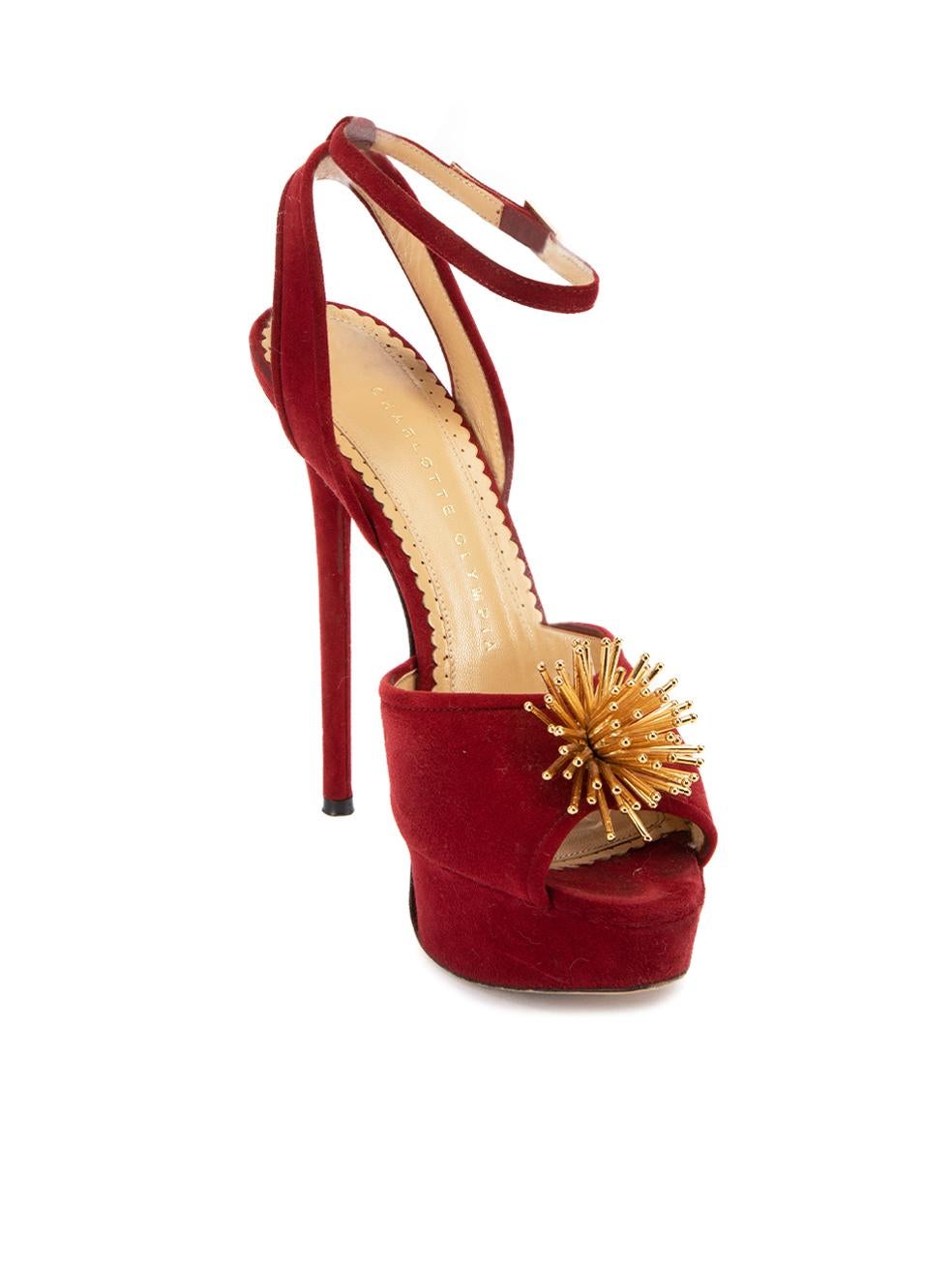 CONDITION is Very good. Minimal wear to heels is evident. Minimal wear to the suede exterior and ankle strap. There is also an imprint to the toe point and wear to the outsole on this used Charlotte Olympia designer resale item. This item comes with